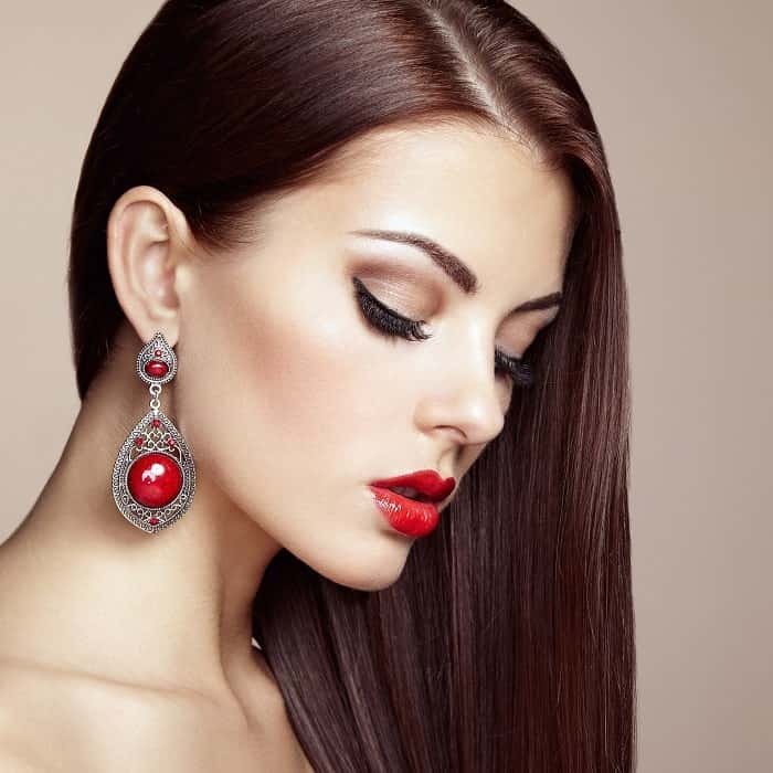 portrait-of-beautiful-brunette-woman-with-earring-2021-08-26-17-05-07-utc-min.jpg